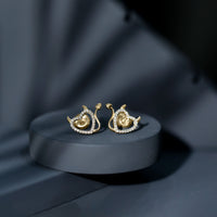 Round diamond devil heart earrings by Rosec Jewels featuring sparkling diamonds and a unique devil heart design.