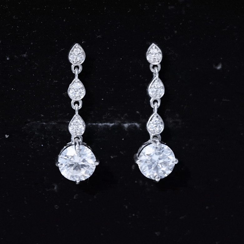 Rosec Jewels Certified Lab 7mm round diamond dangle chain earrings with yellow accents, showcasing elegant sparkling jewelry.