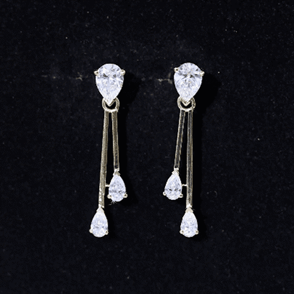 Yellow lab grown diamond teardrop dangle earrings by Rosec Jewels, featuring sparkling gemstone accents and elegant design.