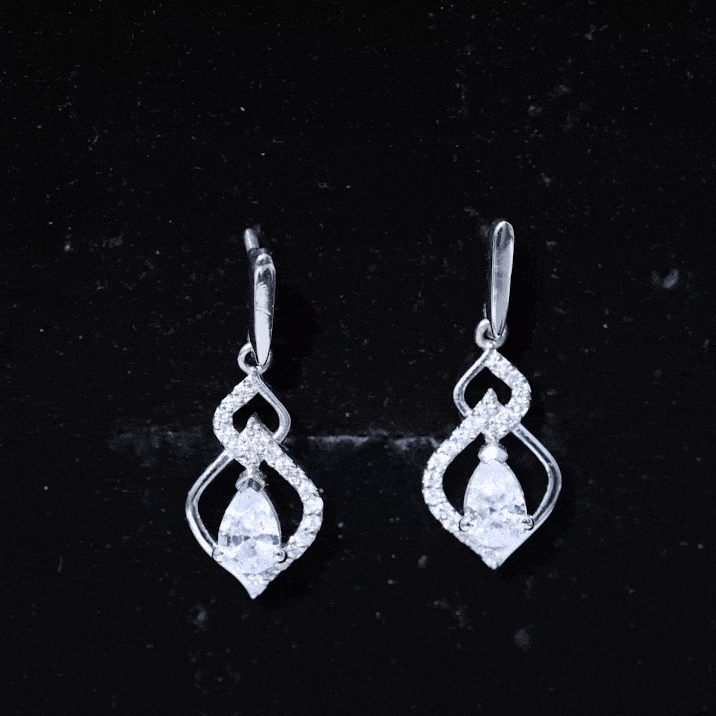 Yellow gold pear-shaped diamond drop earrings with four carats, crafted by Rosec Jewels, perfect for bridal or formal occasions.