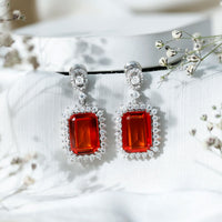 Certified 18 Carat Lab Grown Orange Sapphire Statement Earrings in Silver
