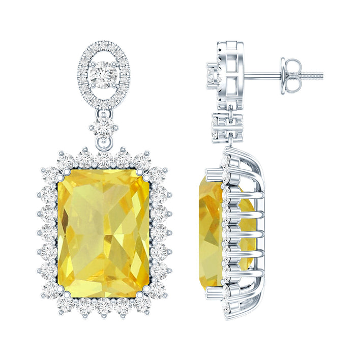 Lab-grown yellow sapphire emerald cut earrings by Rosec Jewels, 18 carat gold in silver setting, showcasing sparkling yellow stones.