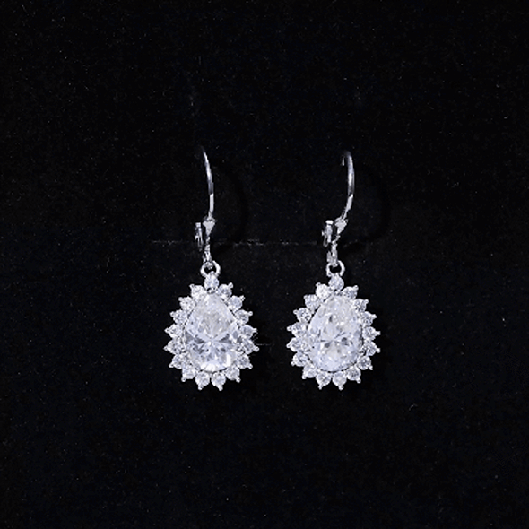 Certified 4 Carat Moissanite drop dangle earrings in silver with sparkling stones, designed by Rosec Jewels.