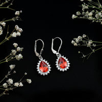 5 Carat Lab Grown Orange Sapphire Teardrop Earrings With Moissanite Halo Accents