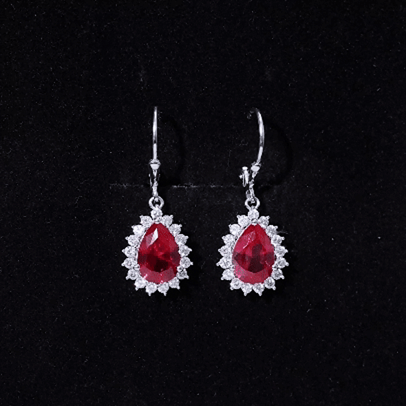 Lab-created 5.8 carat ruby dangle earrings for women by Rosec Jewels featuring vibrant red rubies and elegant design.