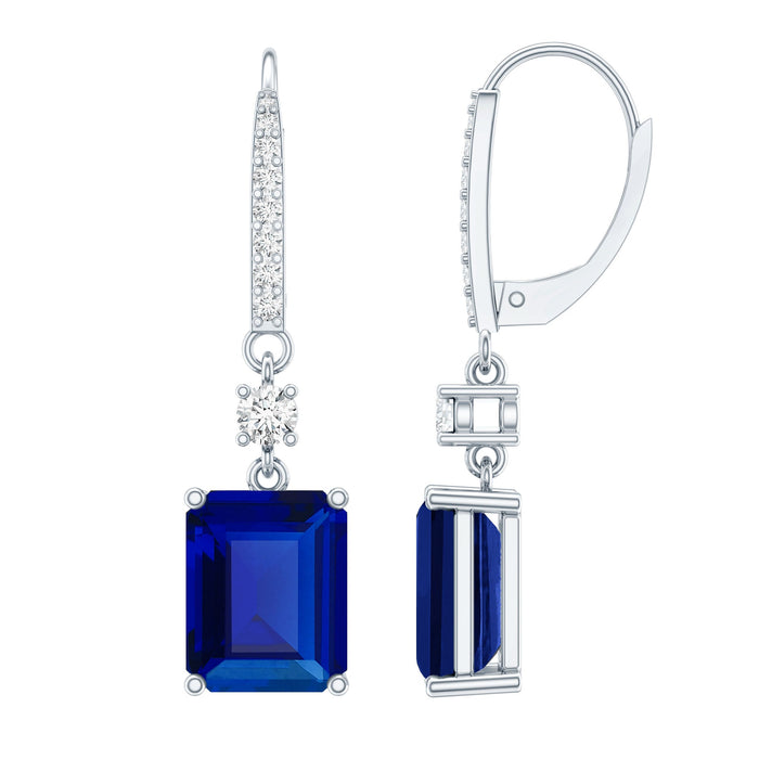 Emerald cut lab-grown blue sapphire drop earrings in silver with 5.5 carats, featuring elegant design from Rosec Jewels.
