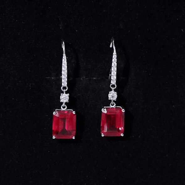 Sterling silver drop earrings with 7-carat lab-created ruby gemstones, featuring elegant design from Rosec Jewels.