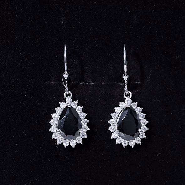 Lab grown black diamond teardrop dangle earrings for women by Rosec Jewels featuring 3.6 carats of sparkling black diamonds.