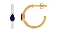 Pear-shaped blue sapphire and diamond hoop earrings by Rosec Jewels featuring elegant gemstone and diamond detailing.