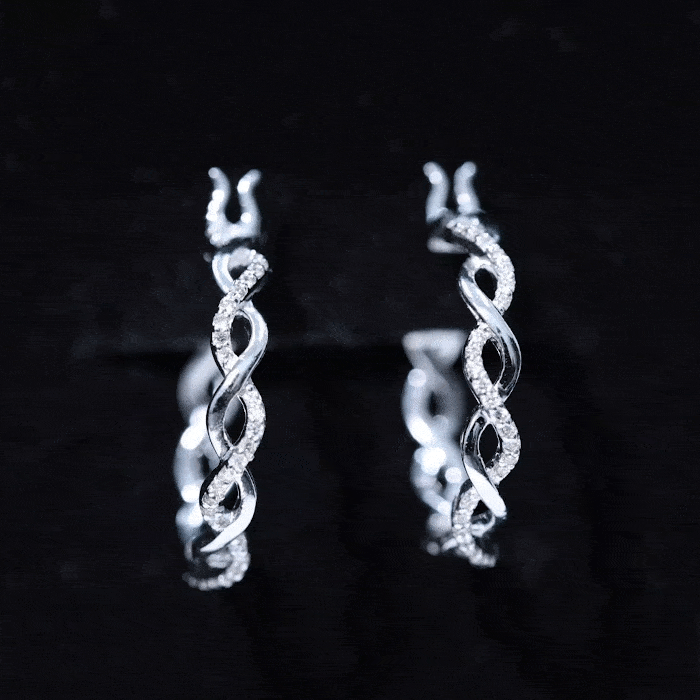 Rosec Jewels braided hoop earrings with sparkling certified moissanite, showcasing intricate design and shimmering stones.