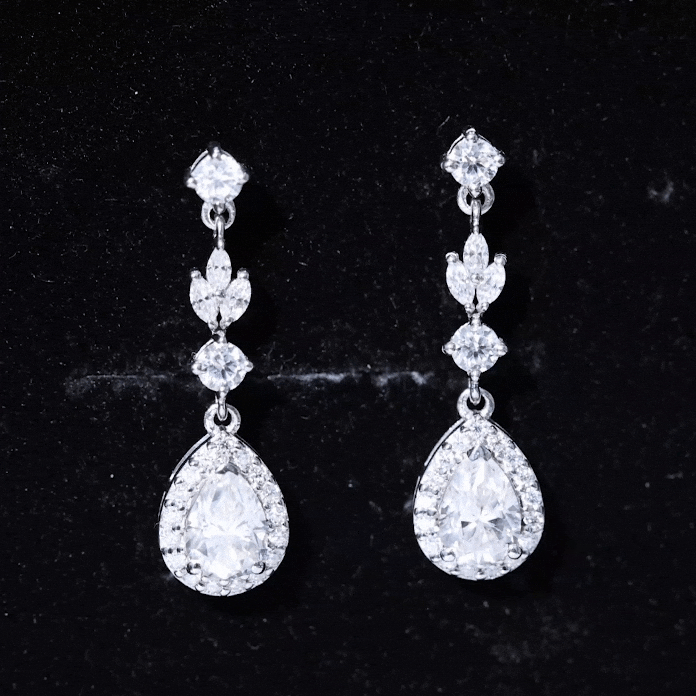Certified Moissanite wedding dangling earrings in silver with sparkling stones, featuring elegant drop design from Rosec Jewels.