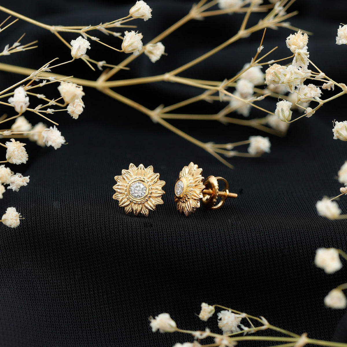 Diamond sunflower stud earrings by Rosec Jewels featuring sparkling diamonds and a sunflower design.
