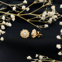 Diamond sunflower stud earrings by Rosec Jewels featuring sparkling diamonds and a sunflower design.