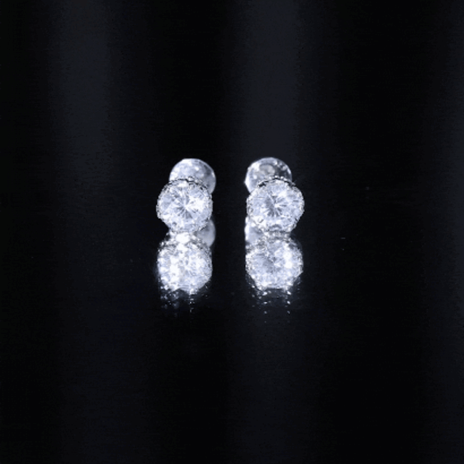 Silver stud earrings with 1 carat round cubic zirconia crown design by Rosec Jewels, showcasing sparkling white gemstone details.