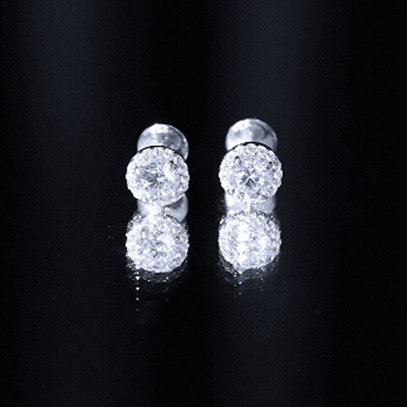Certified 1 Carat round cut CZ diamond stud earrings in silver with sparkling gemstone accents by Rosec Jewels.