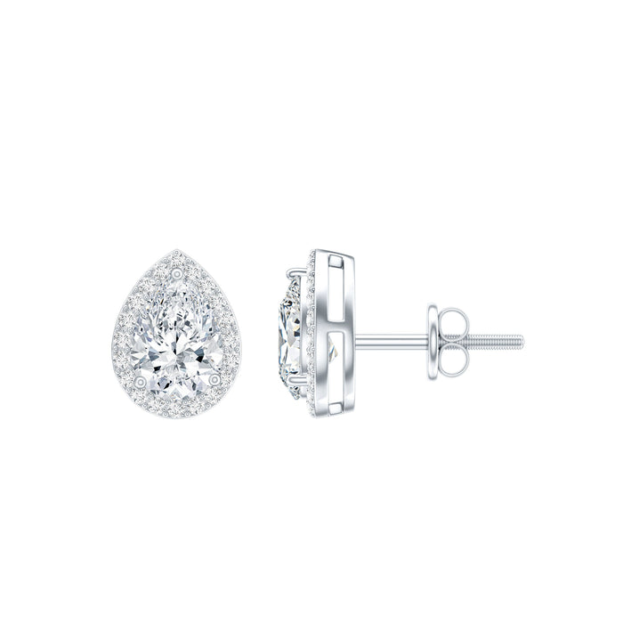 Rosec Jewels 5x7 mm cubic zirconia halo stud earrings featuring sparkling stones and silver-tone metal setting.