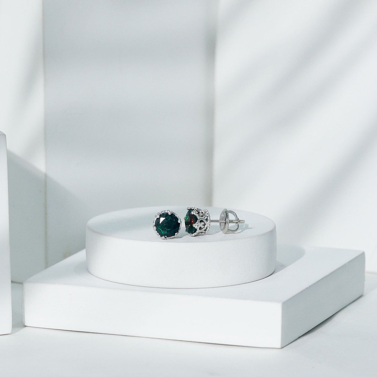 Natural 1.6 carat black opal crown stud earrings in silver, featuring vibrant black opal gemstones and detailed silver settings.