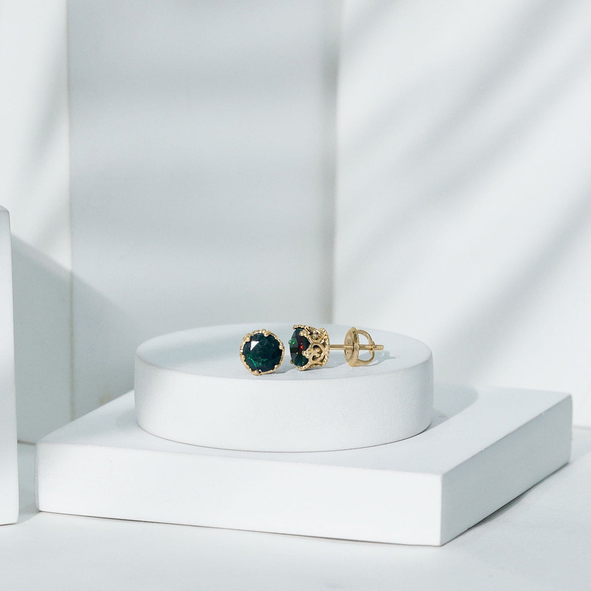 Natural black opal crown stud earrings with screw back by Rosec Jewels, showcasing elegant gemstone and intricate crown design.
