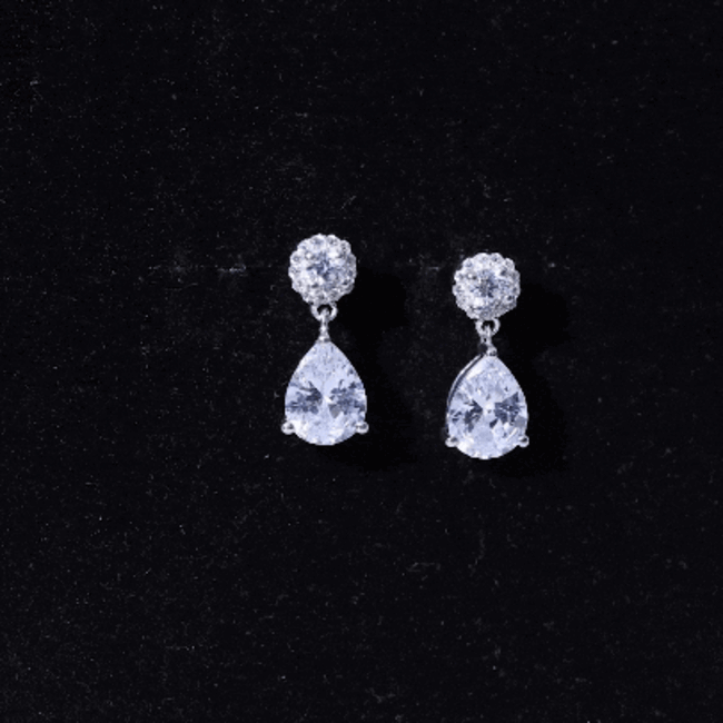 Rosec Jewels 7x9mm zirconia pear drop earrings for weddings, featuring elegant white gemstone design.