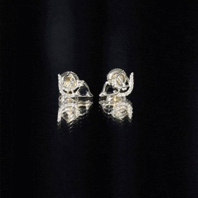 Heart-shaped lab-grown black and white diamond cat stud earrings by Rosec Jewels, showcasing sparkling gemstones and feline design.