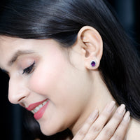 Oval amethyst stud earrings with moissanite halo from Rosec Jewels featuring elegant gemstone and sparkling accent stones.