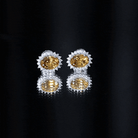 Yellow natural 6x8mm oval citrine stud earrings with halo setting from Rosec Jewels, showcasing the gemstone and elegant design.