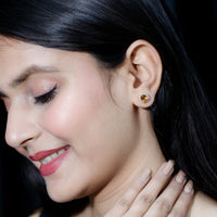 Natural 6x8mm oval citrine stud earrings with halo setting from Rosec Jewels, featuring sparkling citrine gemstones.