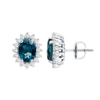 Oval London Blue Topaz stud earrings with moissanite halo, showcasing elegant gemstone jewelry by Rosec Jewels.
