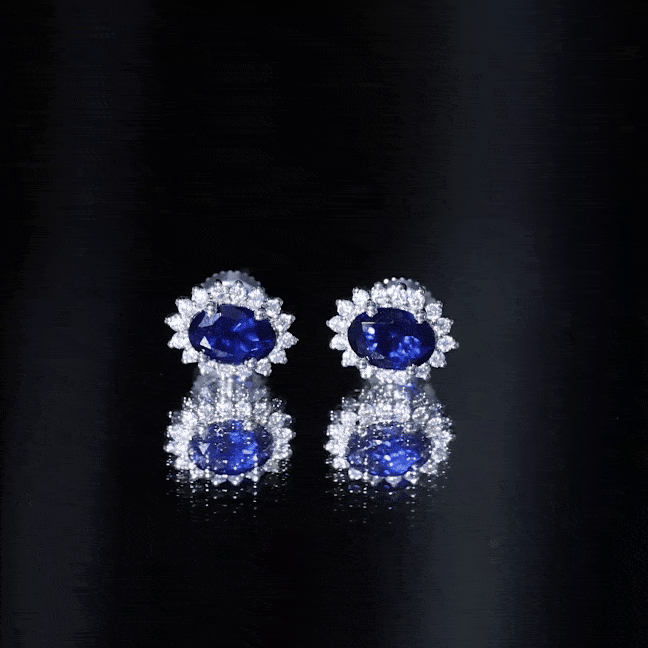 Lab grown blue sapphire stud earrings inspired by Princess Diana in silver, featuring elegant, sparkling gemstones.