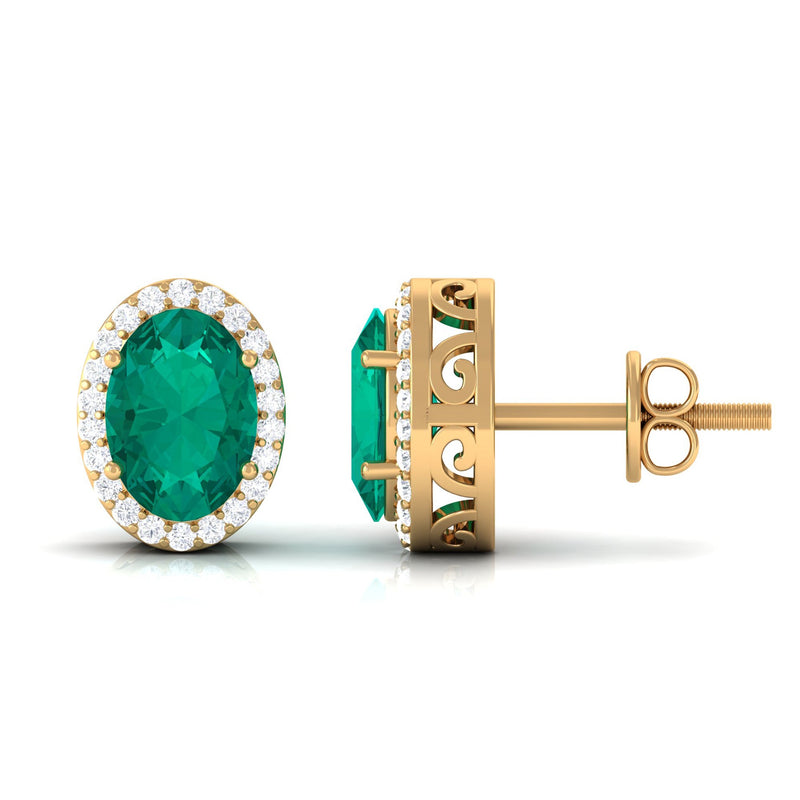 Rosec Jewels 1.75 CT emerald and diamond halo stud earrings showcasing classic design with sparkling gemstones.