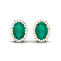 Rosec Jewels 1.75 CT emerald and diamond halo stud earrings showcasing classic design with sparkling gemstones and elegant settings.
