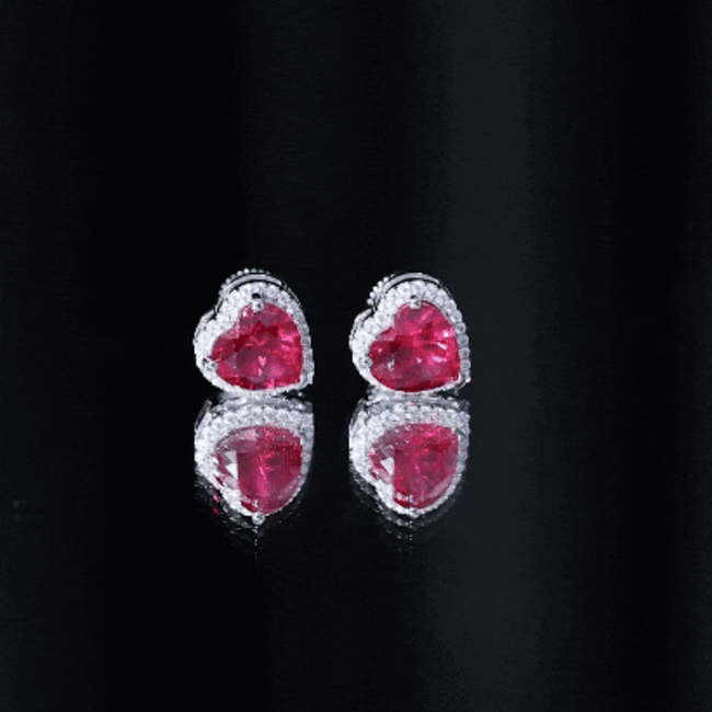 Four-carat lab-grown ruby heart stud earrings with moissanite halo, featuring elegant jewelry design by Rosec Jewels.
