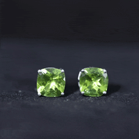 Genuine cushion cut peridot solitaire stud earrings by Rosec Jewels, showcasing sparkling green gemstones with certificate.
