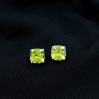 Genuine cushion cut peridot solitaire stud earrings by Rosec Jewels with certification, featuring vibrant green gemstones and classic design.