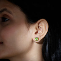 Genuine cushion cut peridot solitaire stud earrings by Rosec Jewels with certification, featuring vibrant green gemstones.