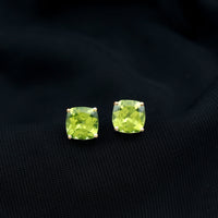 Genuine cushion cut peridot solitaire stud earrings by Rosec Jewels with certificate, featuring vibrant green gemstones and elegant design.