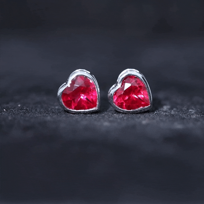 Yellow 4-carat heart-shaped lab-grown ruby stud earrings for women by Rosec Jewels, featuring vibrant gemstone design.