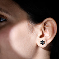 Natural black spinel floral cluster stud earrings by Rosec Jewels featuring intricate flower-shaped design and sparkling black spinel stones.