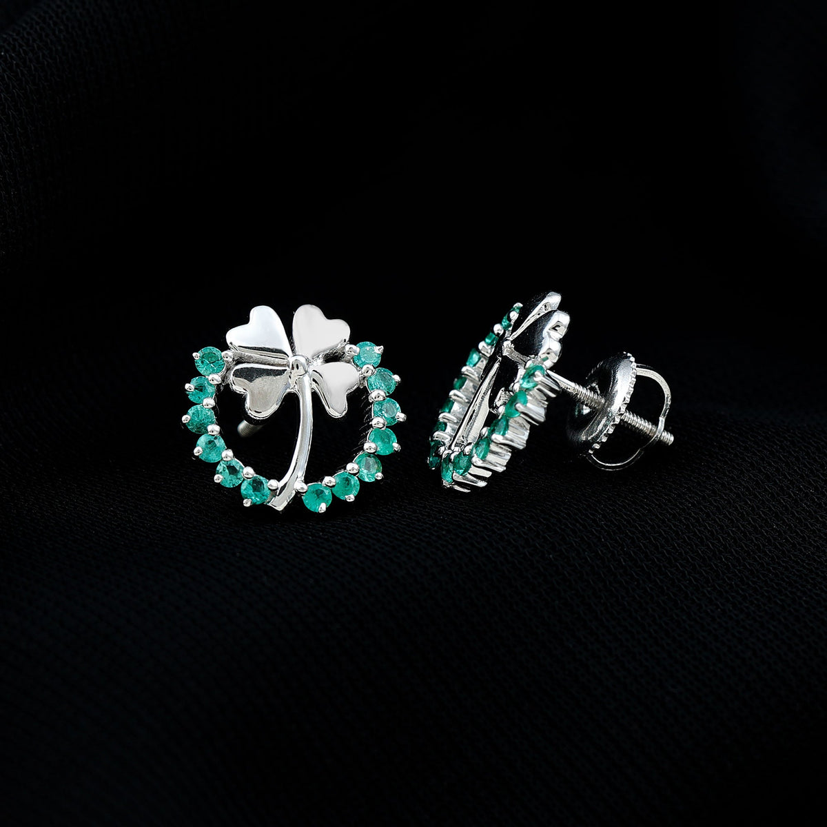 Genuine emerald clover stud earrings for women by Rosec Jewels, featuring four-leaf clover design with sparkling green emeralds.