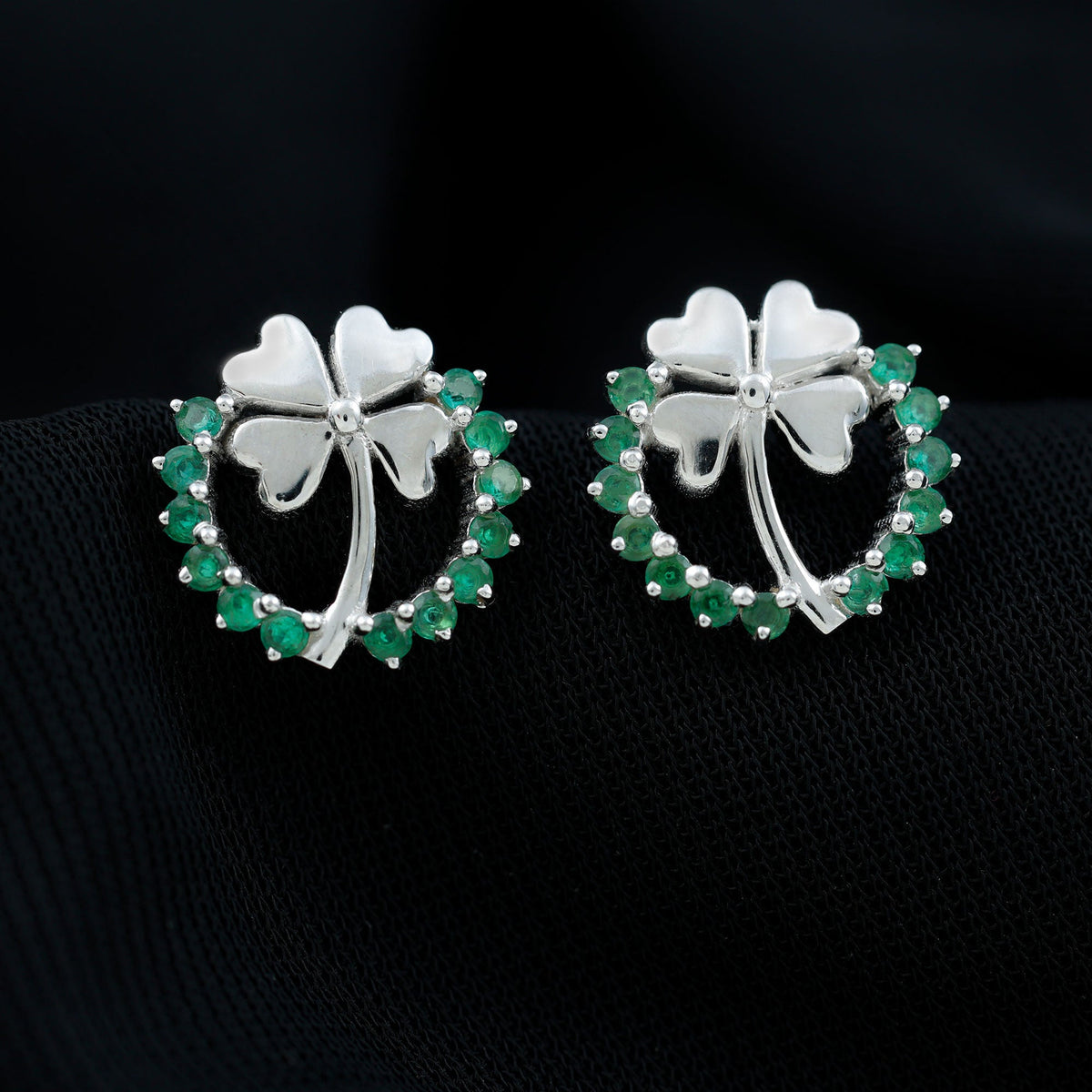 Genuine emerald clover stud earrings for women by Rosec Jewels featuring three-leaf clover design and sparkling green gemstones