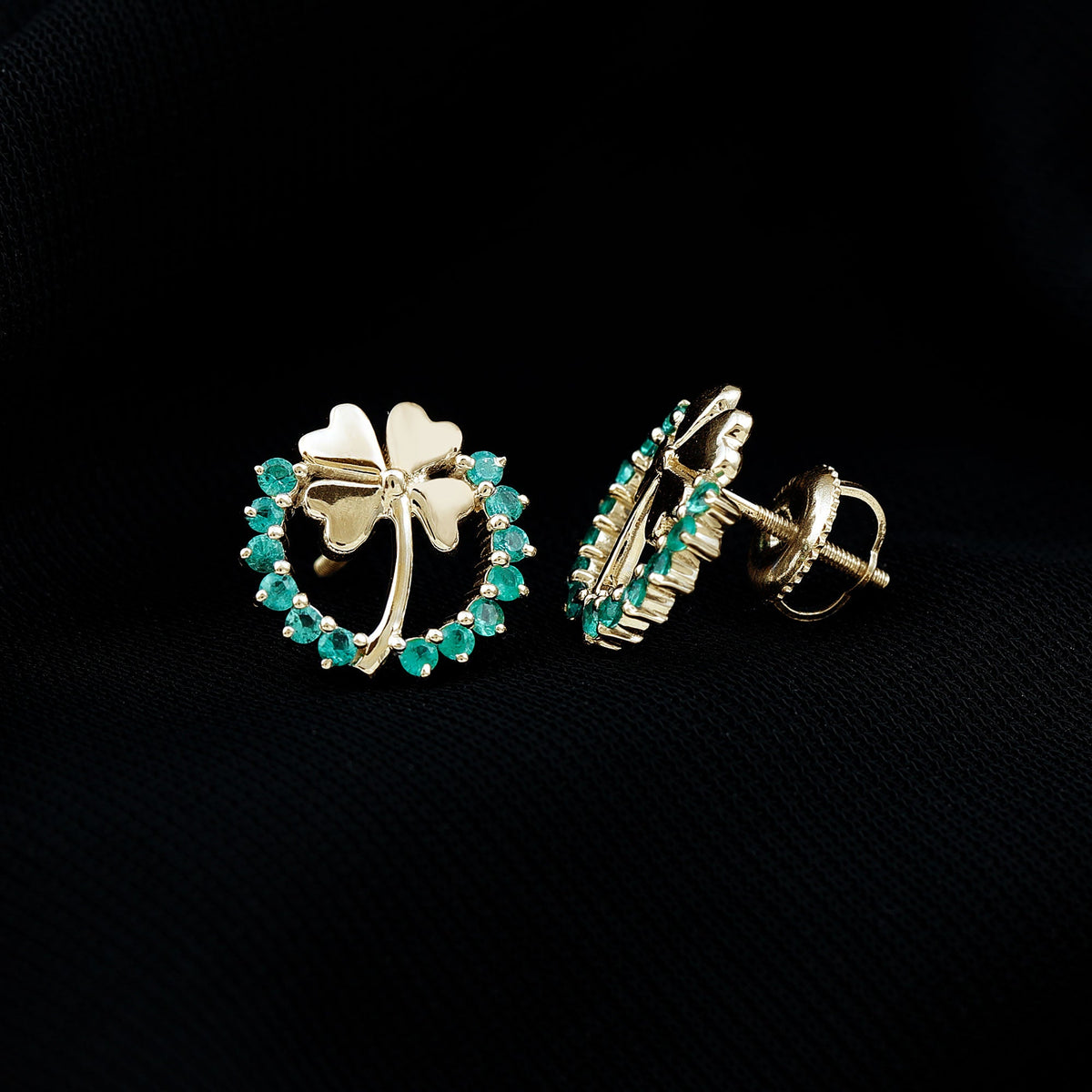 Genuine emerald clover stud earrings for women by Rosec Jewels, featuring four-leaf clover design with sparkling green emeralds.