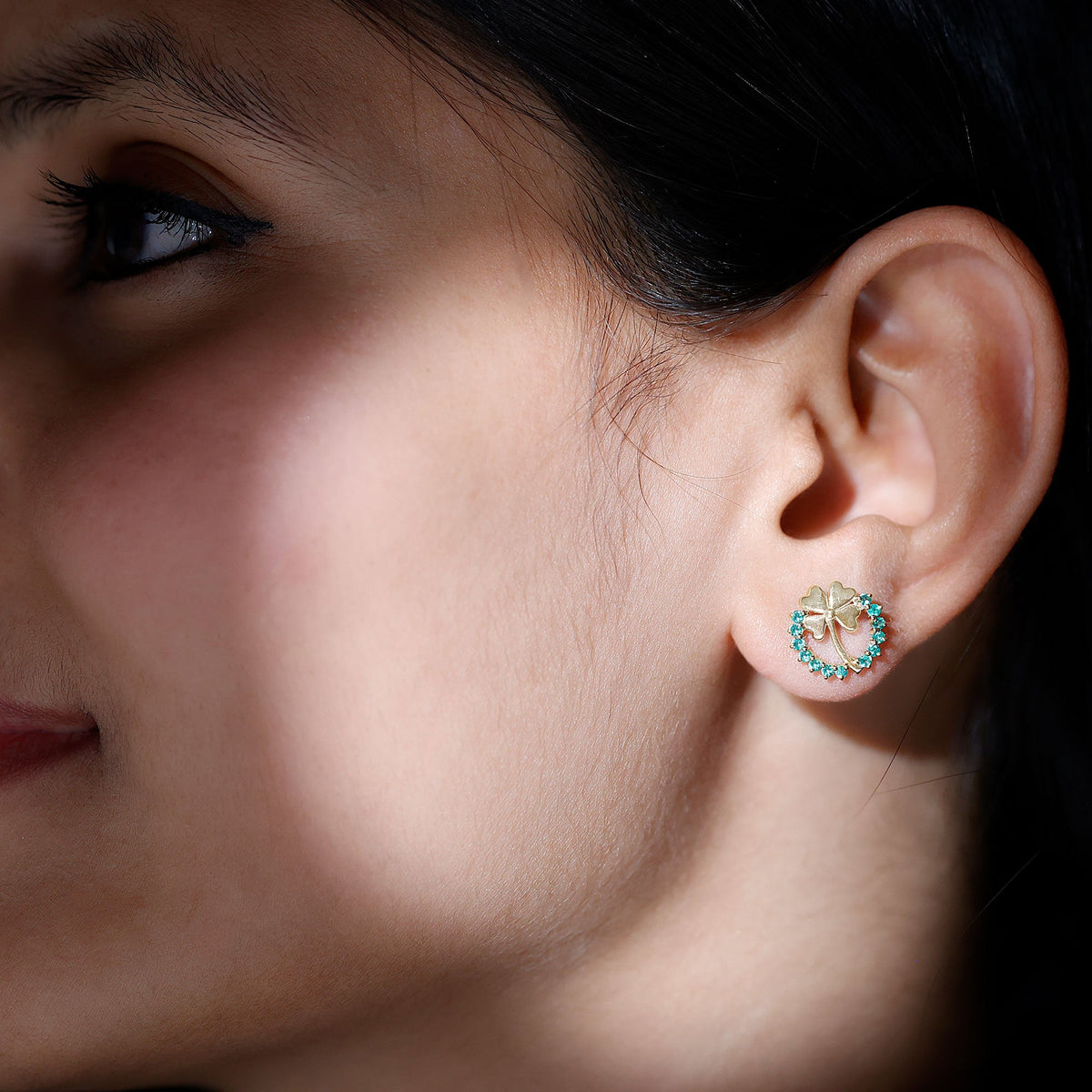 Genuine emerald clover stud earrings for women by Rosec Jewels featuring four-leaf clover design and sparkling green gemstones.
