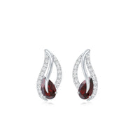 Pear-shaped garnet and diamond leaf stud earrings by Rosec Jewels featuring elegant gemstone and metal design.