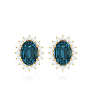 Oval cut London Blue Topaz and diamond starburst stud earrings by Rosec Jewels featuring sparkling gemstones and intricate design.