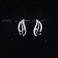 Genuine pear-shaped black onyx leaf stud earrings by Rosec Jewels with certificate, featuring silver posts and detailed leaf design.