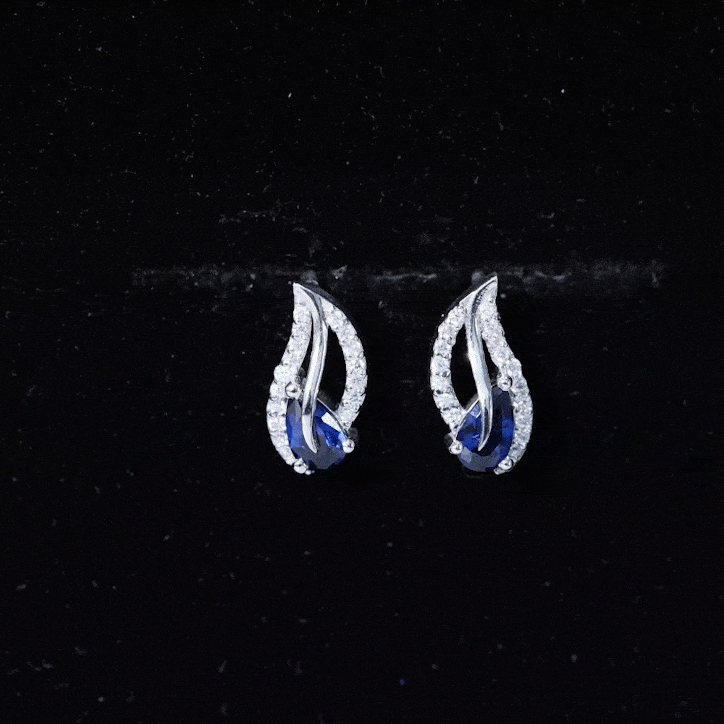 Lab grown blue sapphire leaf earrings with moissanite accents, featuring elegant sterling silver design from Rosec Jewels.