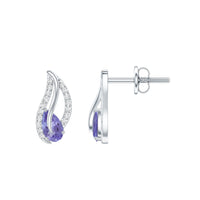 Pear-shaped Tanzanite and diamond leaf stud earrings featuring elegant jewelry design by Rosec Jewels.