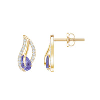 Pear-shaped Tanzanite and diamond leaf stud earrings by Rosec Jewels featuring elegant gemstone and sparkling diamond details.