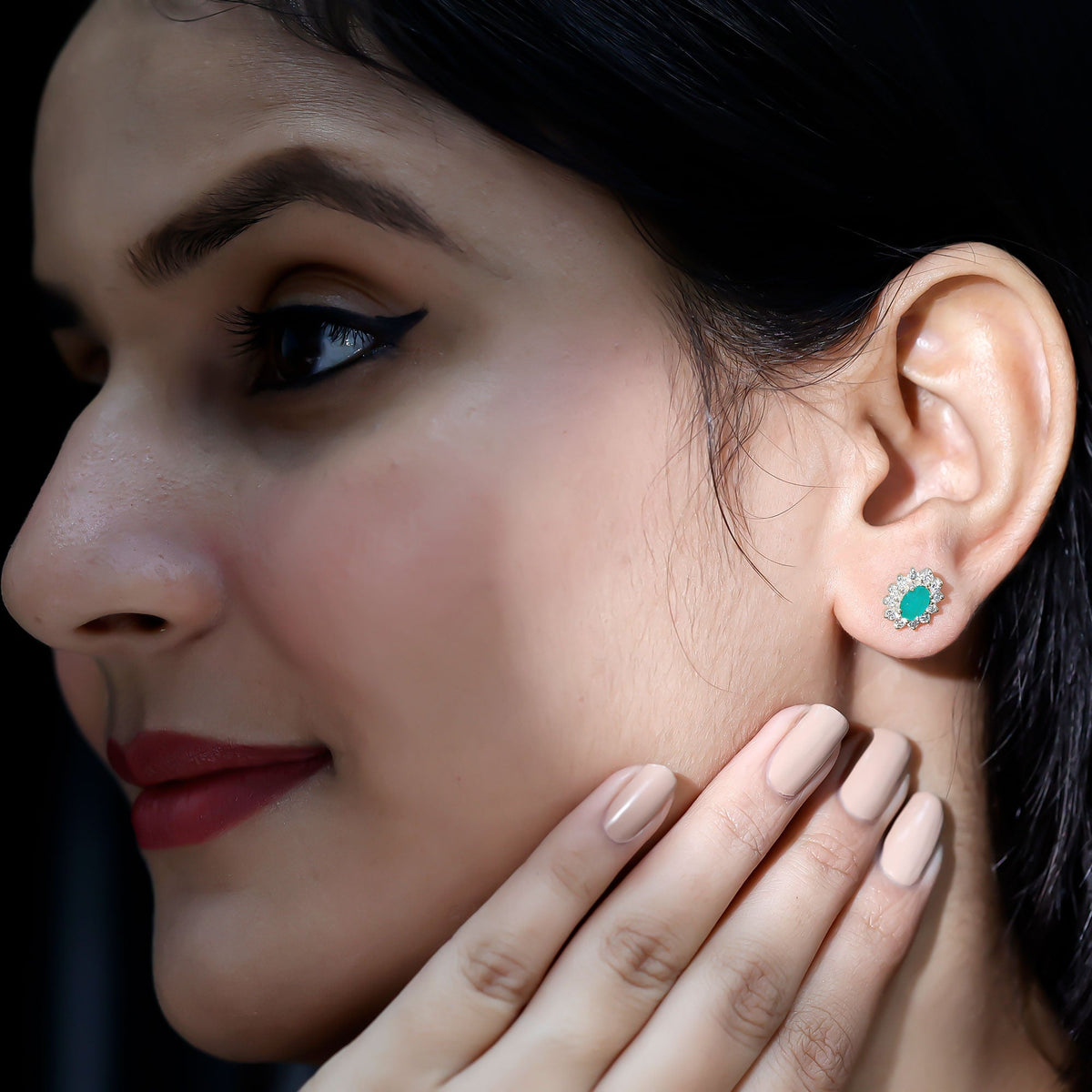 Oval cut emerald and diamond earrings by Rosec Jewels featuring a natural 0.8 carat gemstone design.
