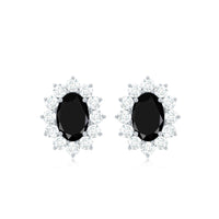 Certified real oval black onyx stud earrings with diamond halo by Rosec Jewels, featuring a sleek black gemstone and sparkling accents.